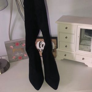 Thigh high heeled  boots